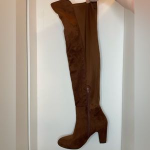 Brown knee high heeled boots
